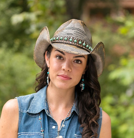 Model in nice cowboy hat with beads