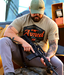 Armed AF t-shirt on man with hat