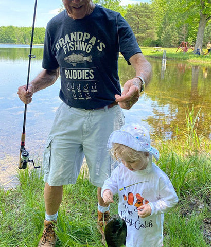 photo of grandpa wearing Grandpa's Fishing Buddies t-shirt