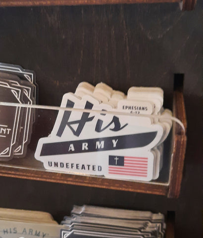 Patriotic Christian sticker on display in gift shop teeslanger