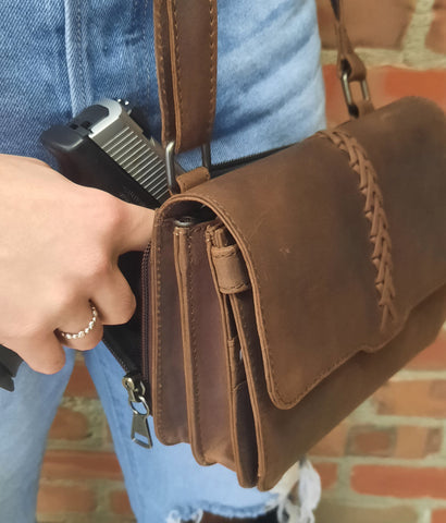 small leather conceal carry purse and model