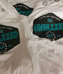 antivax t-shirts in pile