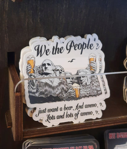 We the People sticker on display in gift shop