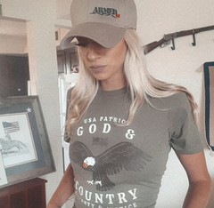 Patriotic female wearing a God and Country t shirt