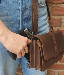 conceal carry purse on model with gun